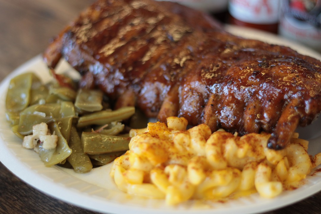 Carolina Brothers BBQ plate with ribs, mac n' cheese, and green beans