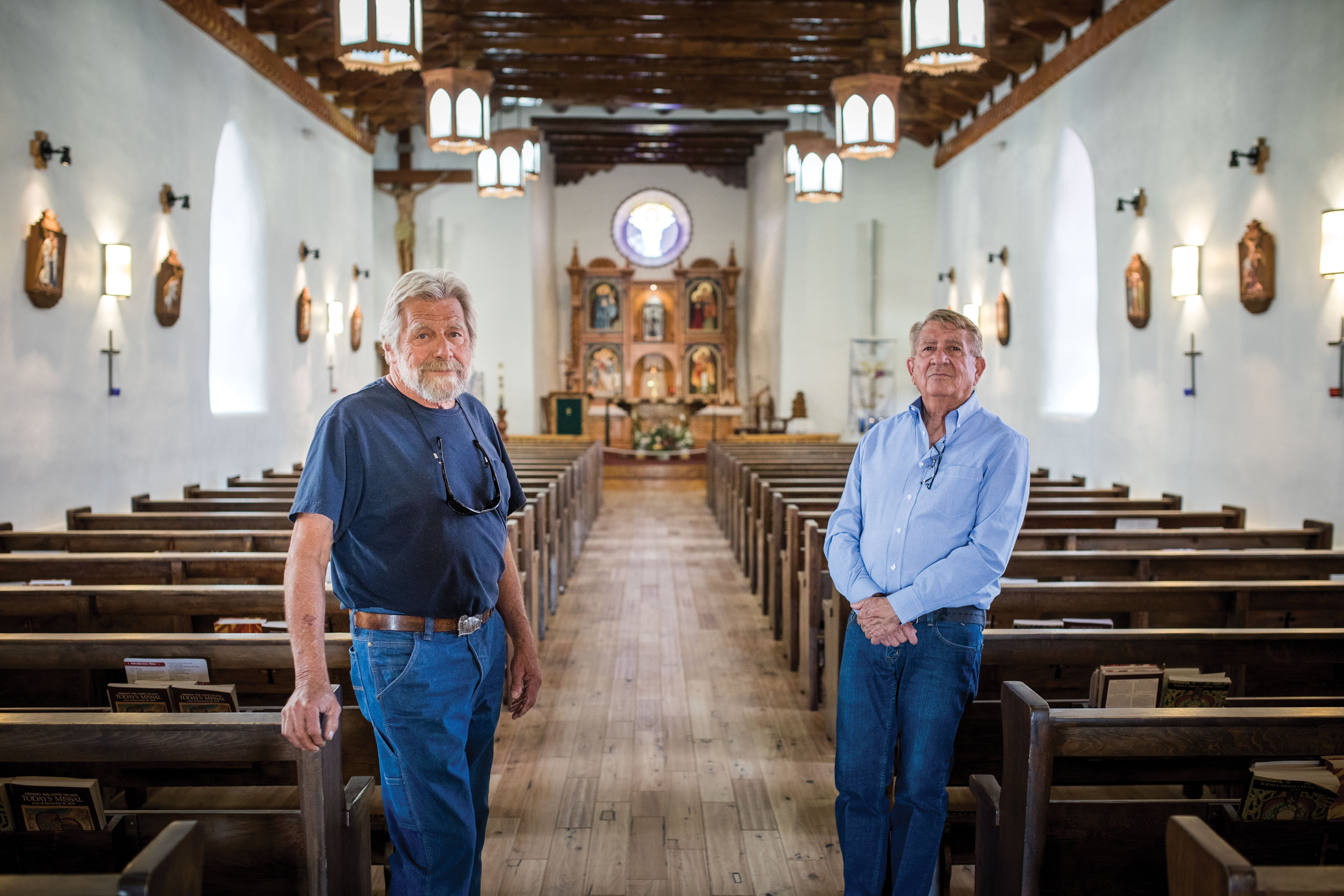 Mark Sideris (left) and Flavio Cisneros led the restoration of St. Anthony's church