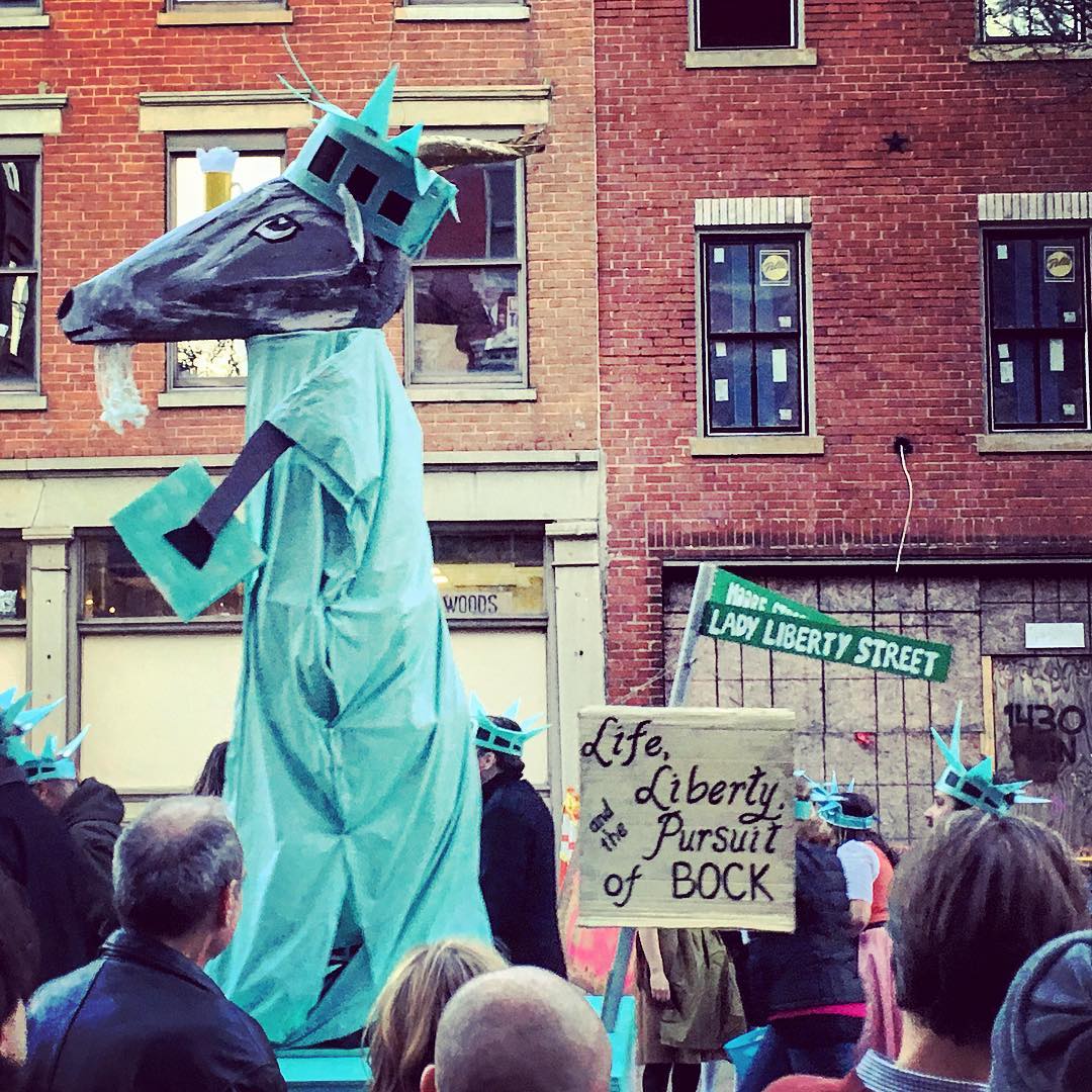 A Bockfest parade float with a giant goat dressed as the Statue of Liberty in downtown Cincinnati