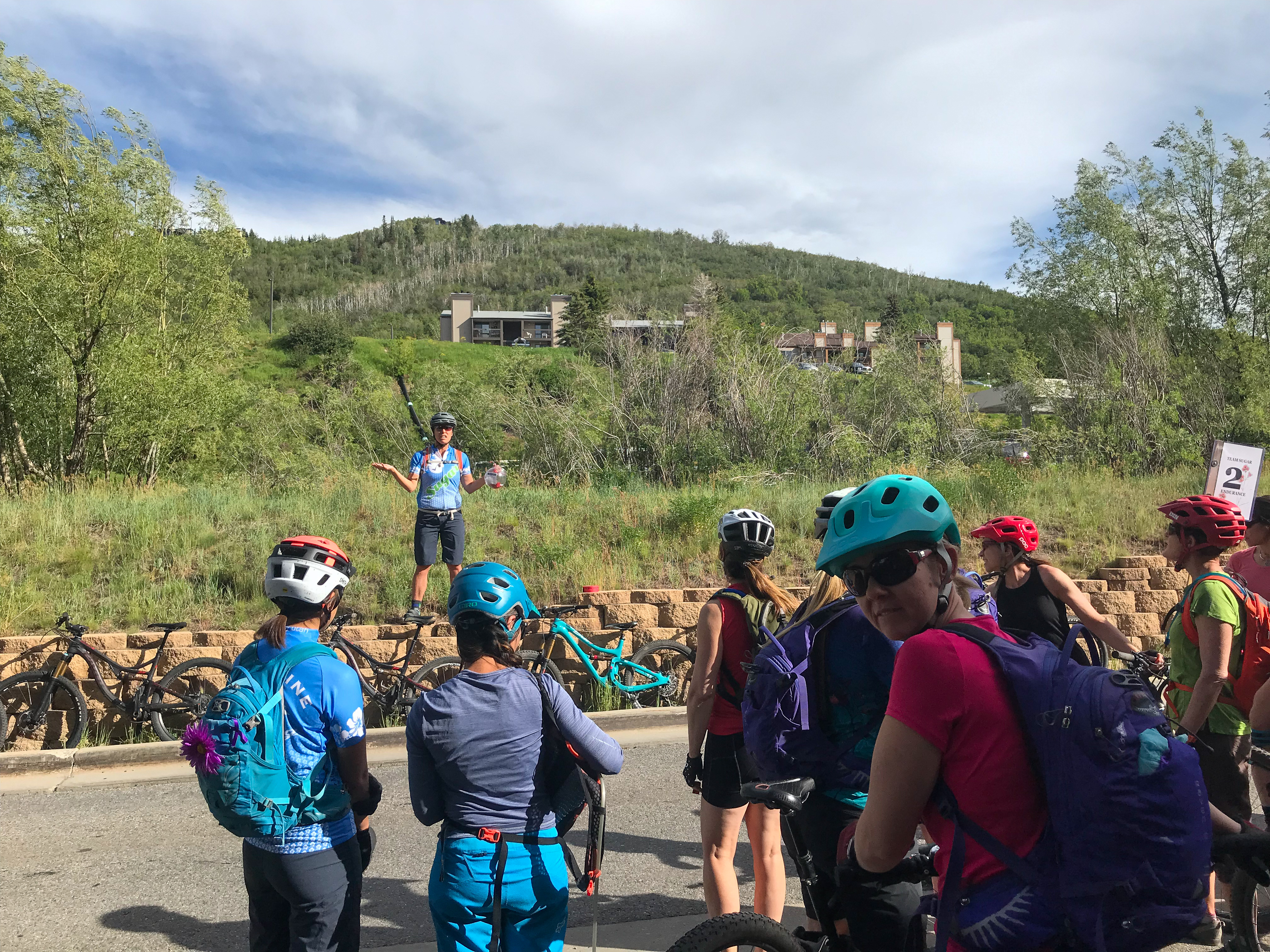 guide talking to a group of riders