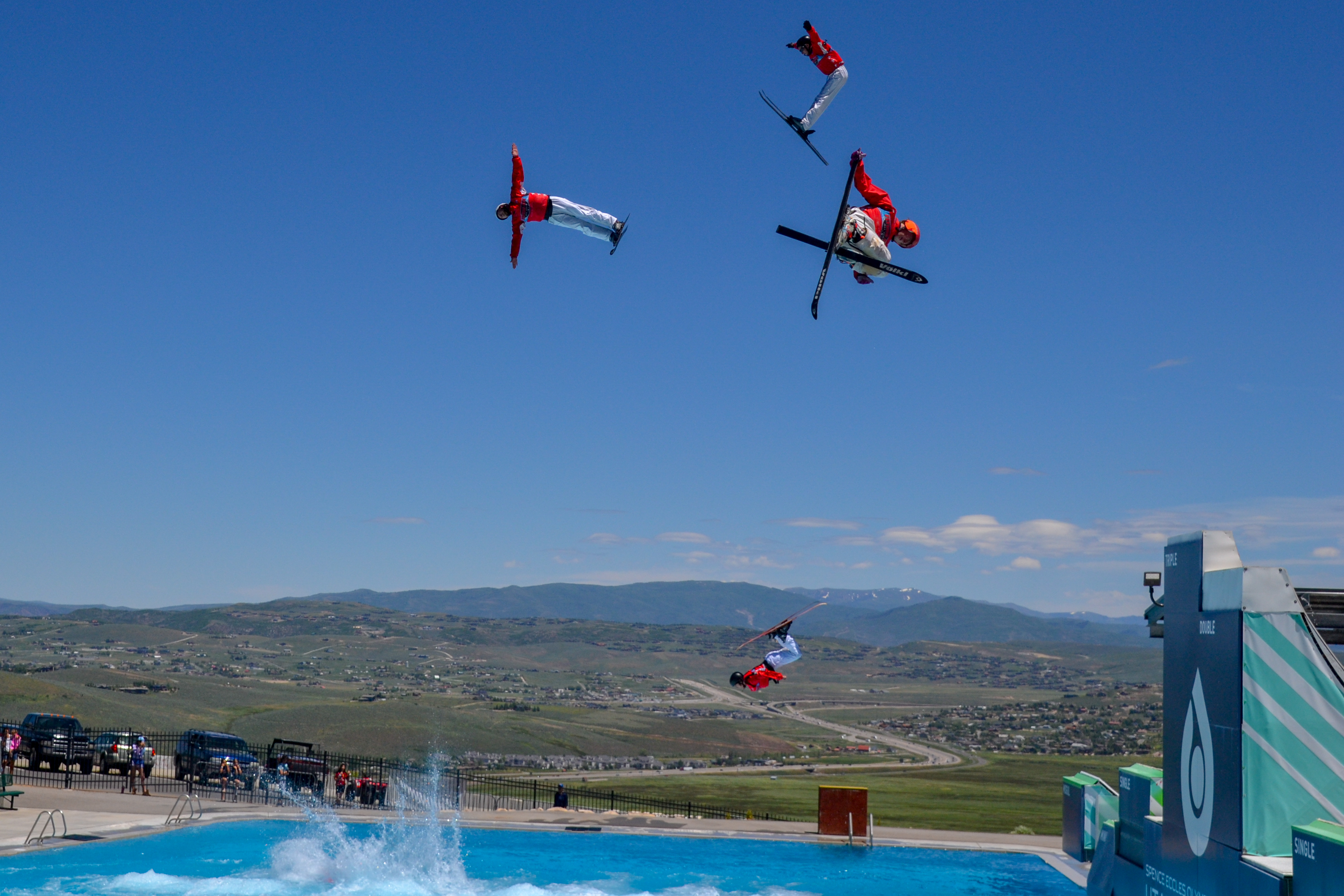 Freestyle Skiers Jumping into pool at Utah Olympic Park