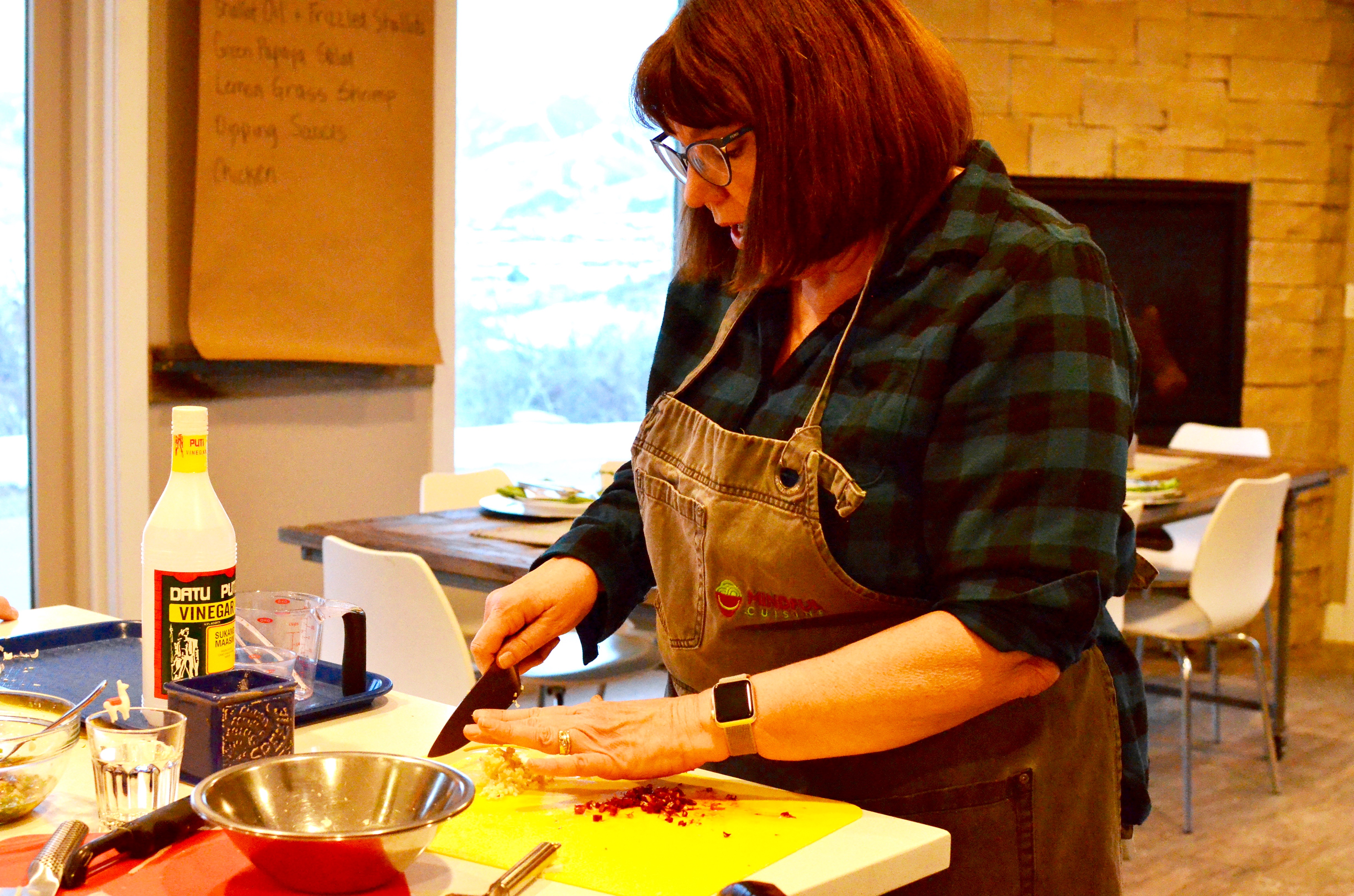 Chef Linda chopping vegetables