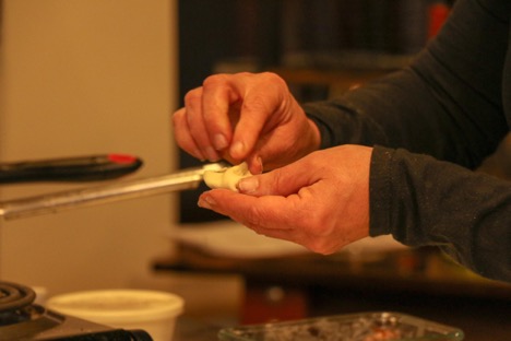 chefs hands making a pastry puff
