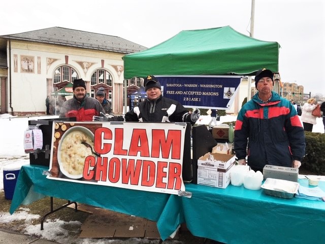 Tent and clam chowder sign outside VC