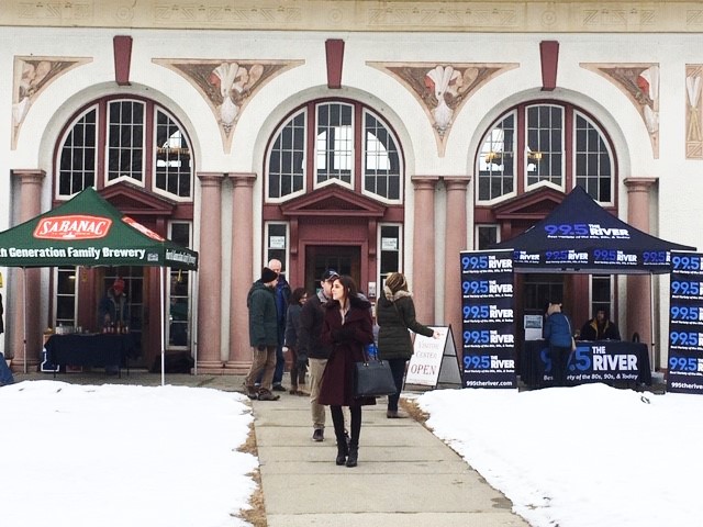 People walking in and out of the Visitor Center