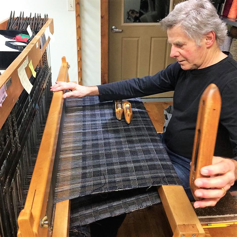 Fritelli and Lockwood weaver at loom
