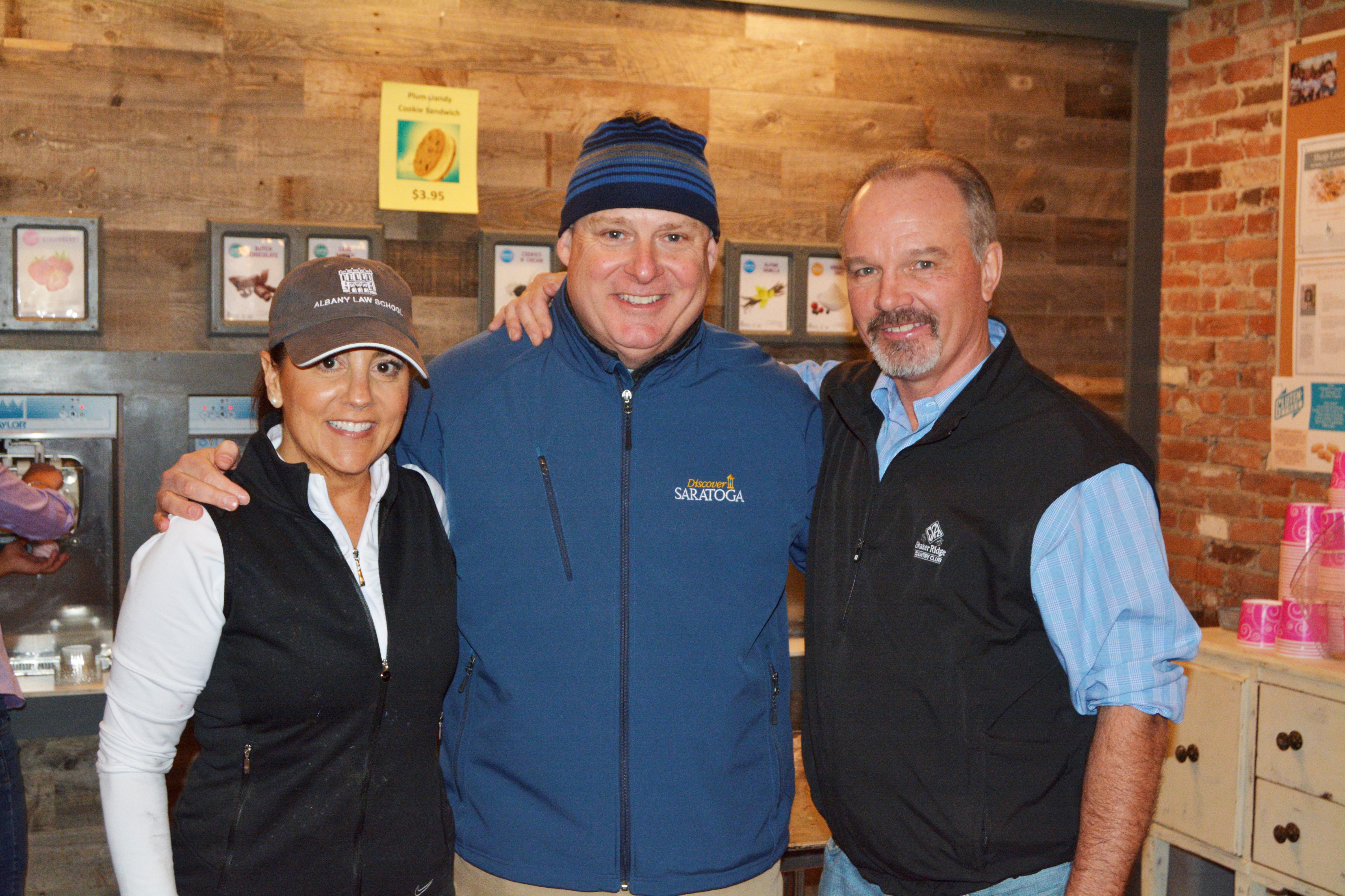 Darryl posing with the owners of Plum