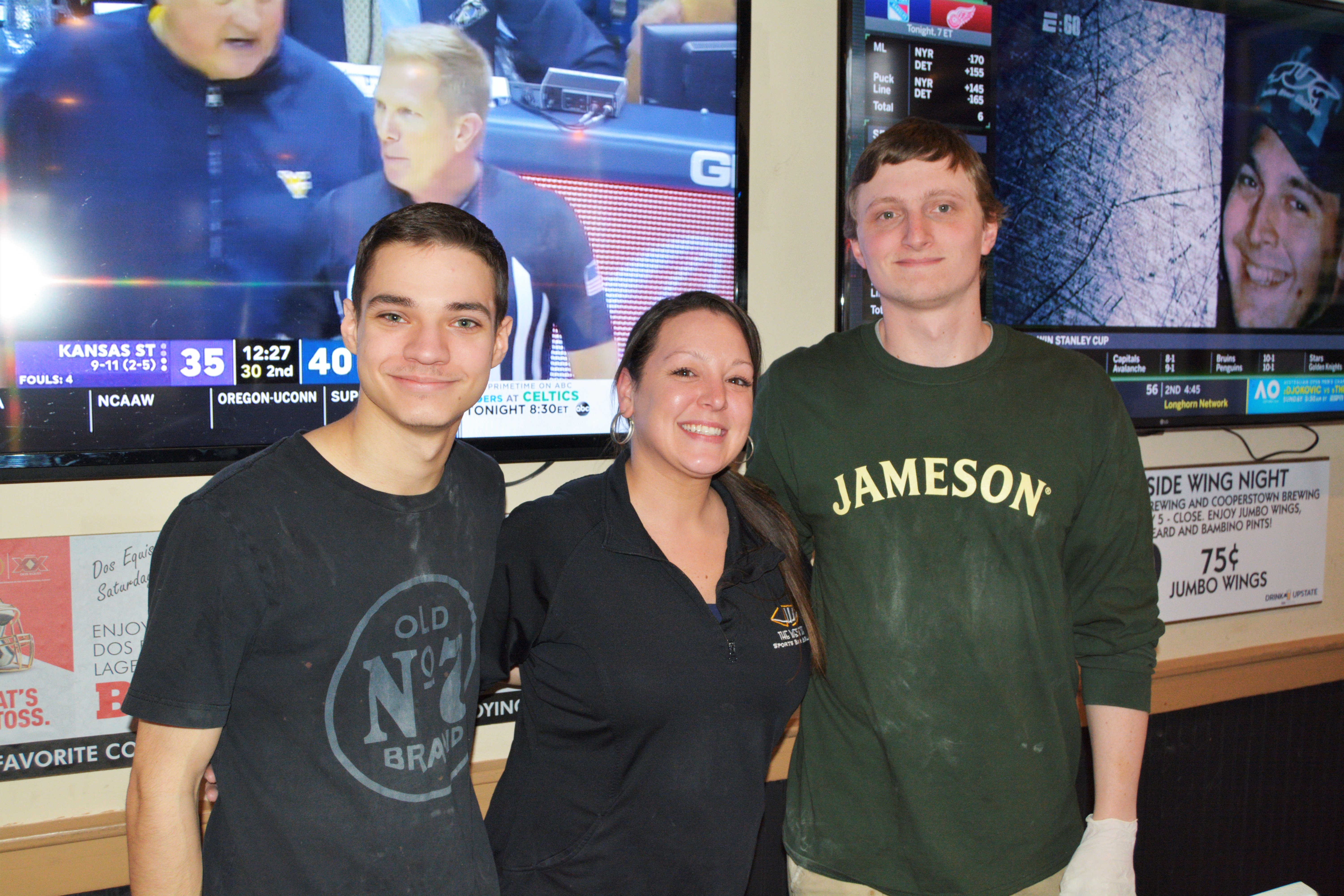 West Side Stadium 3 servers in front of TVs