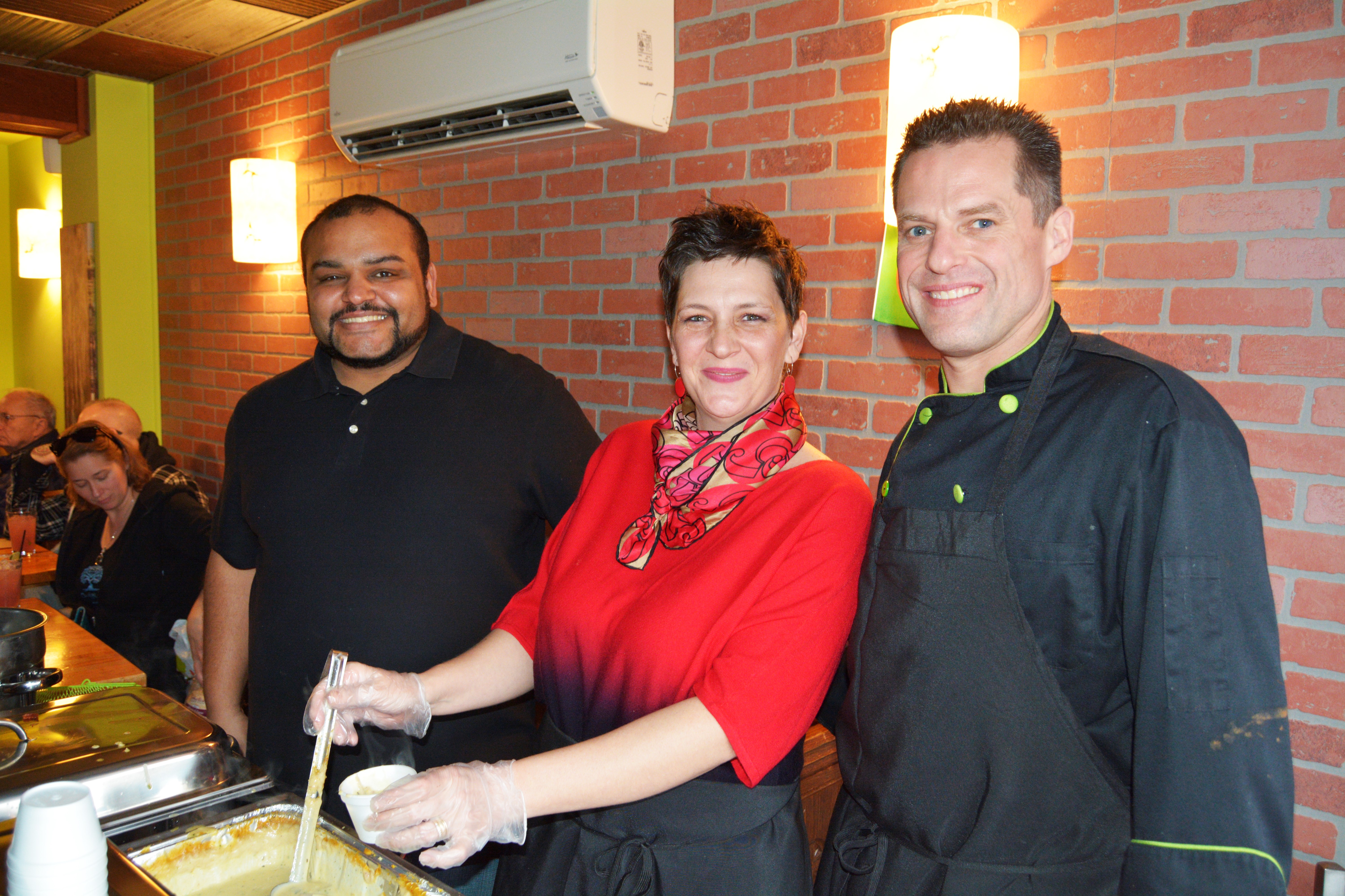 Dizzy Chicken servers posing with chowder