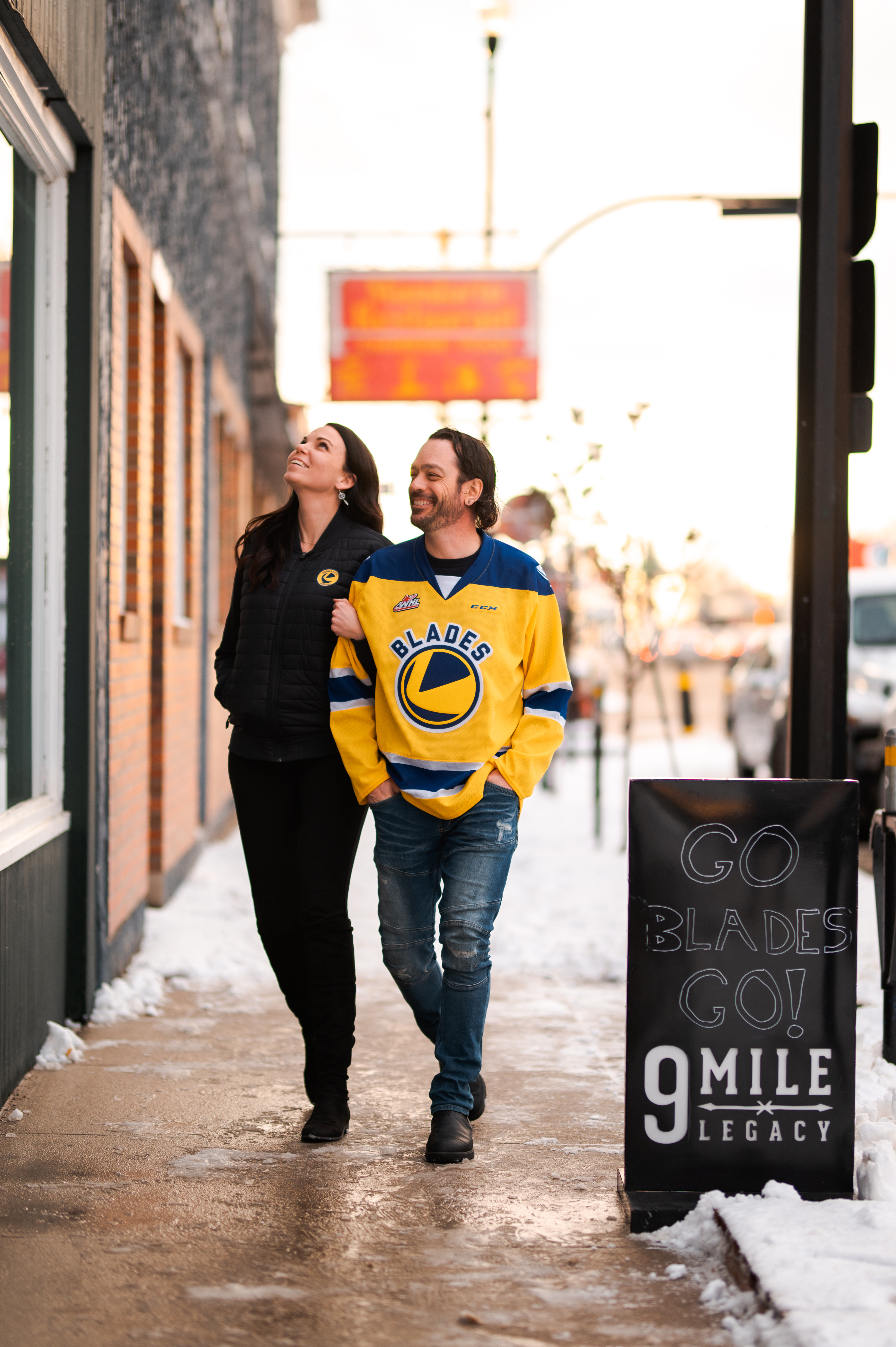 people walking wearing blades jersey