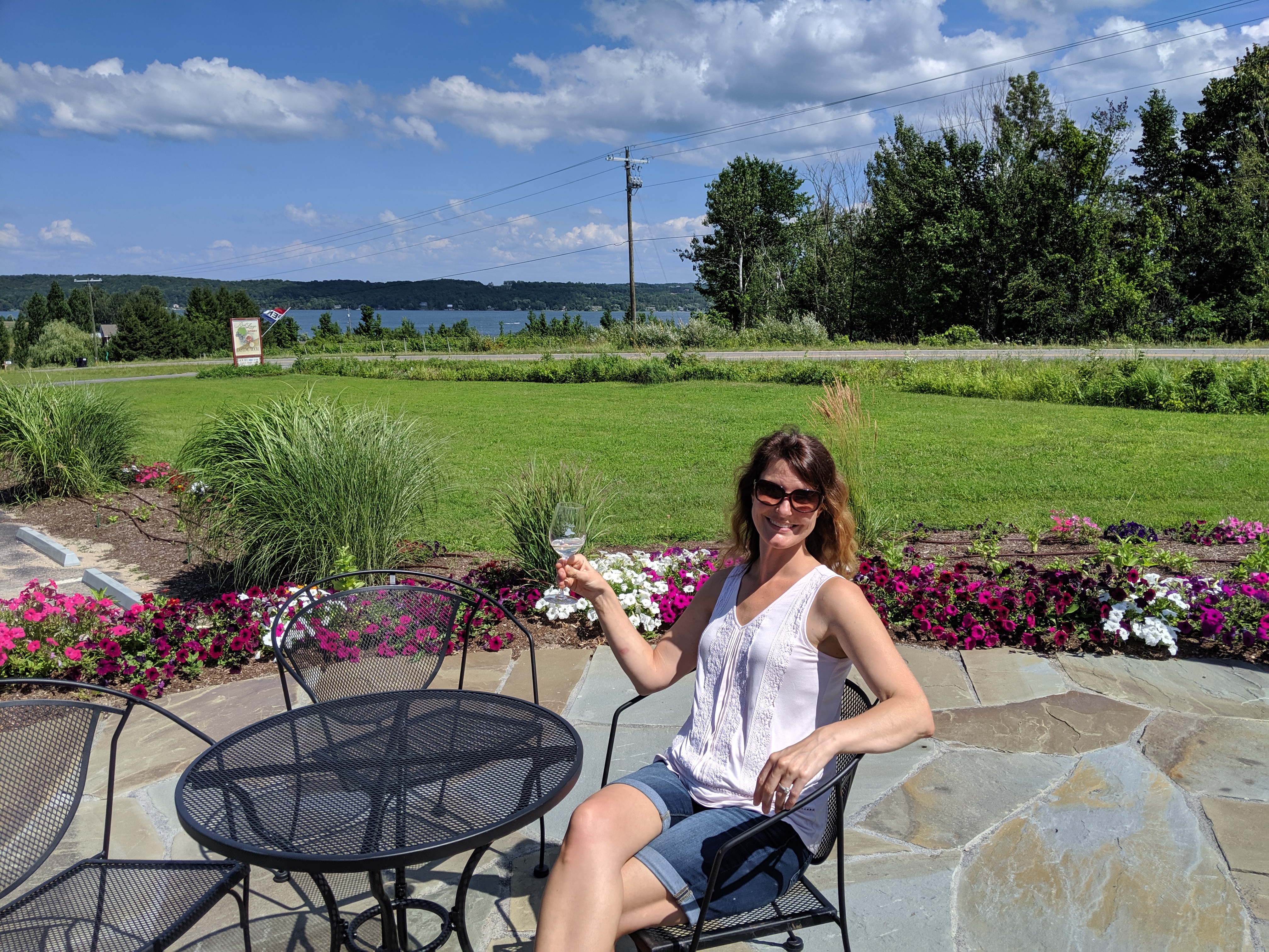 Stay awhile...enjoy a glass of wine on Bel Lago's Patio with stunning views of Lake Leelanau