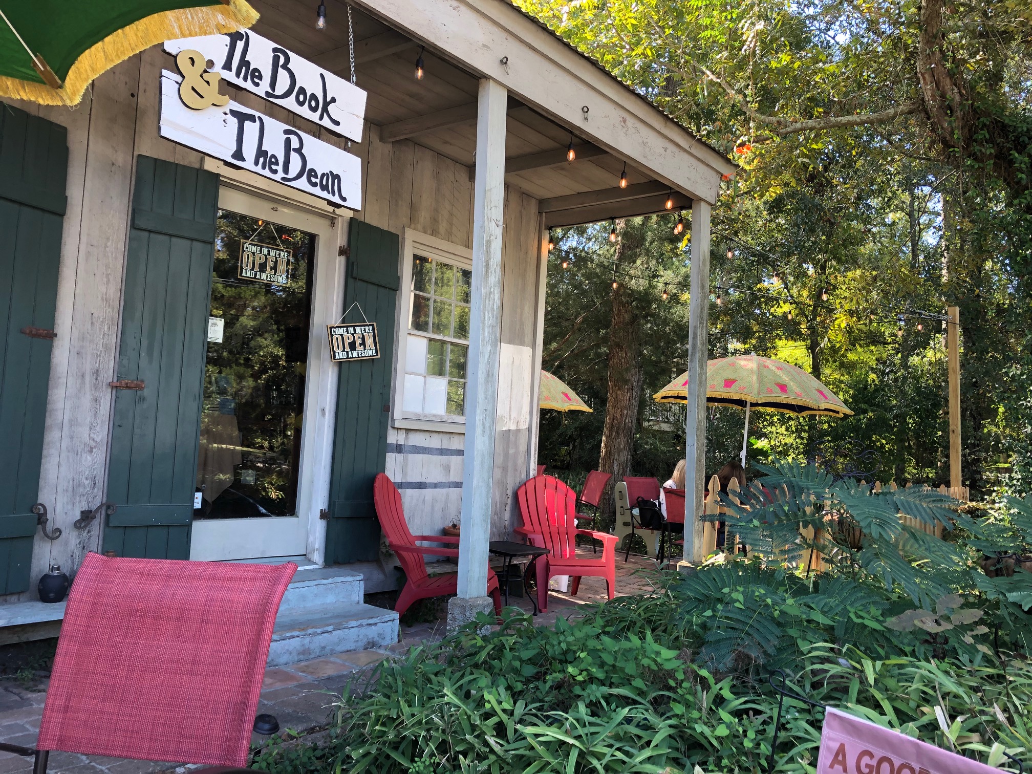 Exterior view of The Book and the Bean coffee shop in Mandeville, LA