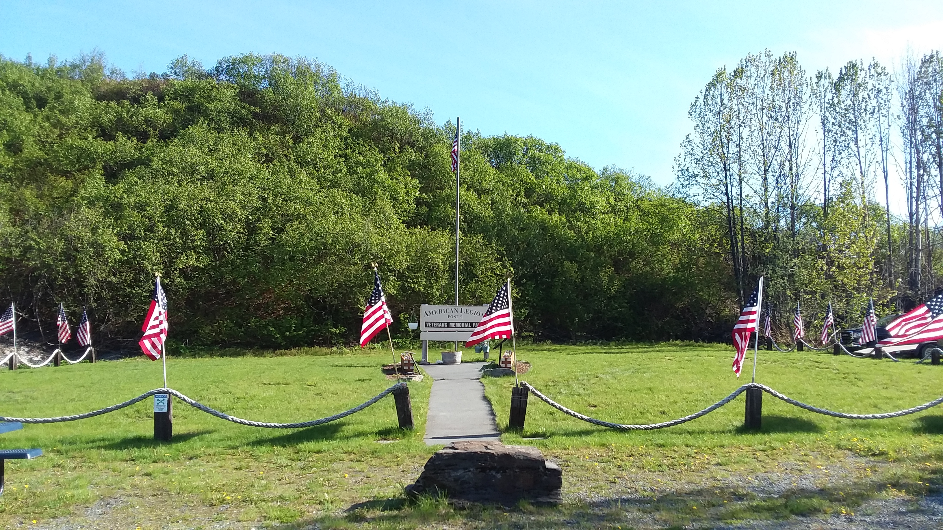 A memorial park with American flags