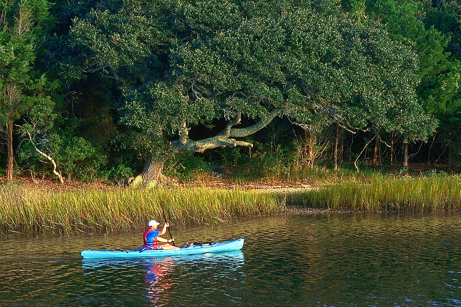 Solo kayaker in river