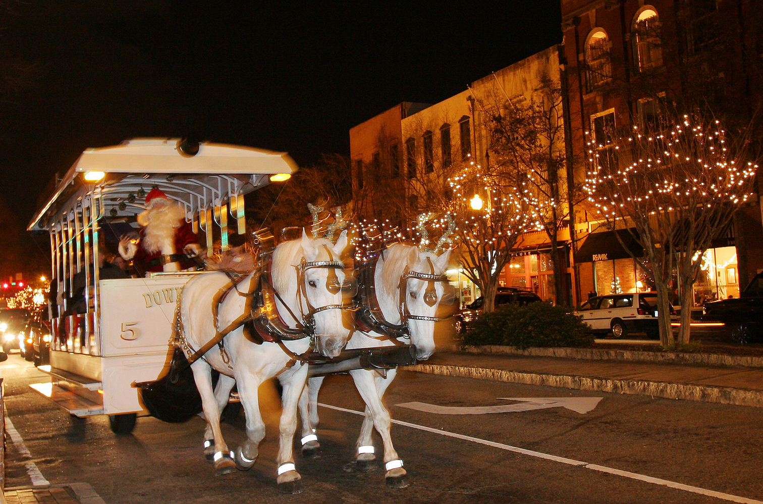 Horse-drawn trolley tour led by Santa
