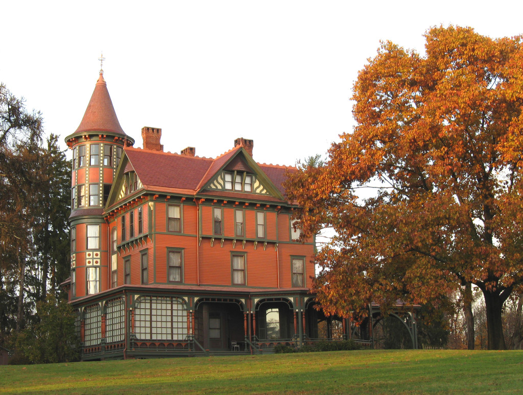 The mansion at Wilderstein Historic Site framed by fall foliage