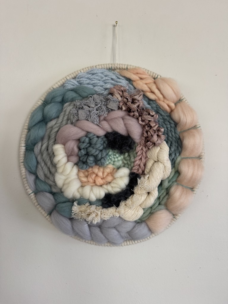 Examples of the colorful creations from the Tapestry Weaving Workshop at Clover Brooke Farm in Hyde Park