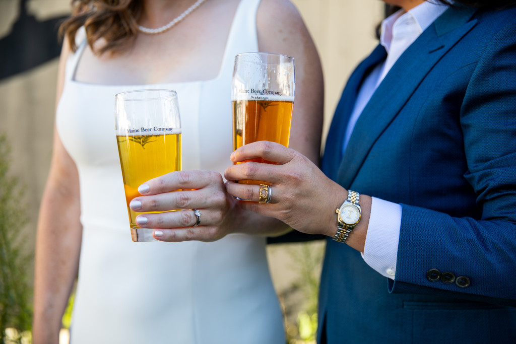 Wedding Couple with Beer. Photo Credit: Drew Buerhaus