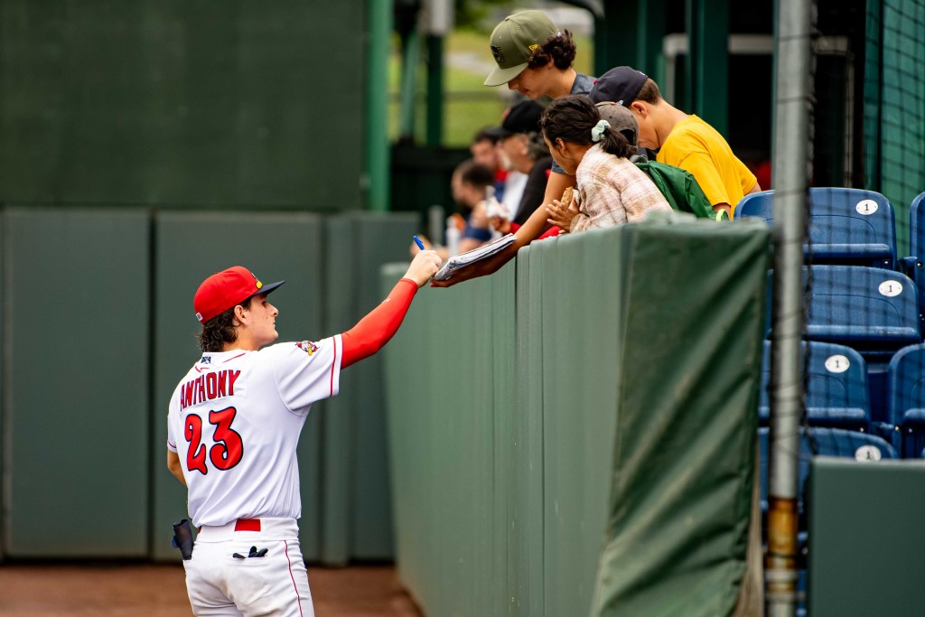 Player with fans. Photo Credit: Cullen McIntyre / Portland Sea Dogs