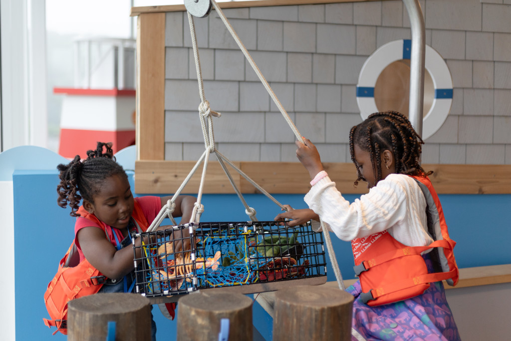 Kids Playing in Lobster Boat. Photo Credit: Hannah Elsworth