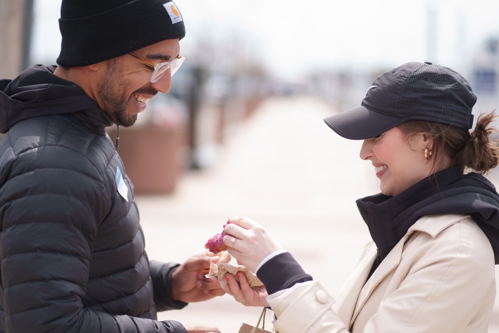 Couple Tasting Donut. Photo Credit: Good Maine