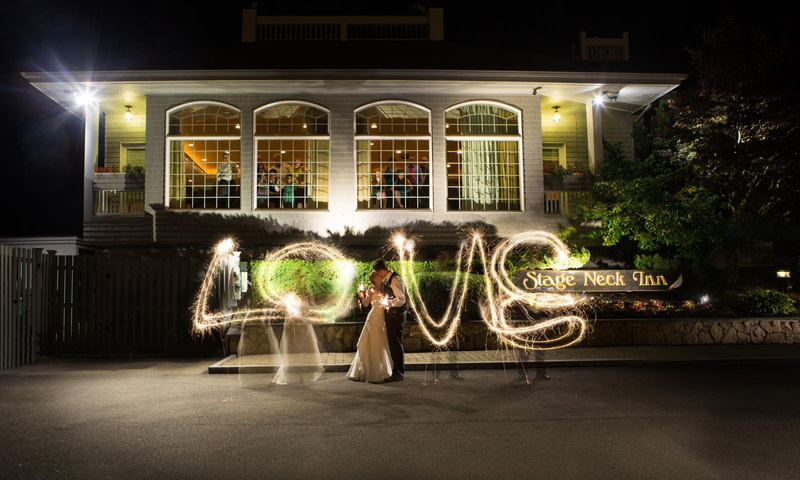 Wedding Couple with Sparklers. Photo Credit: Focus Photography