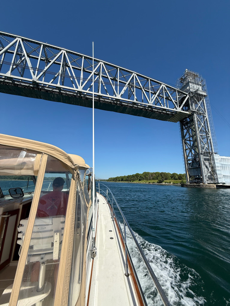 Boat Going Under Bridge. Photo Credit: Casco Bay Legacy Charters