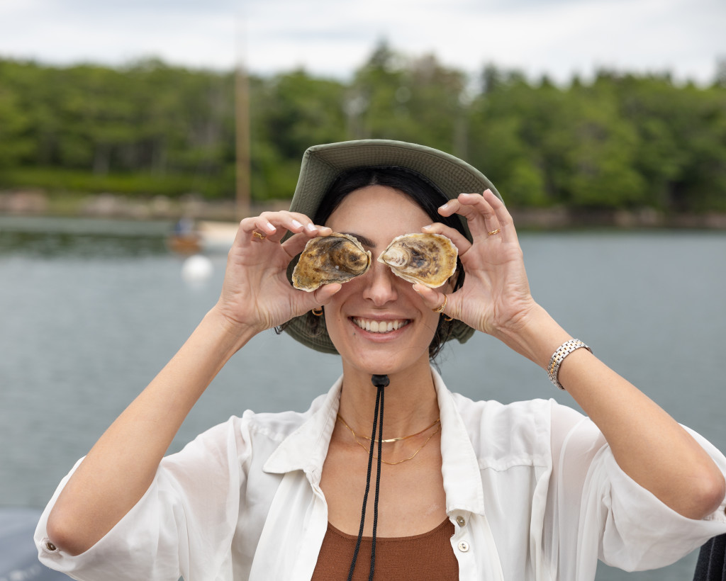Girl with Oysters. Photo Credit: Lady Oyster Tours & Tastings