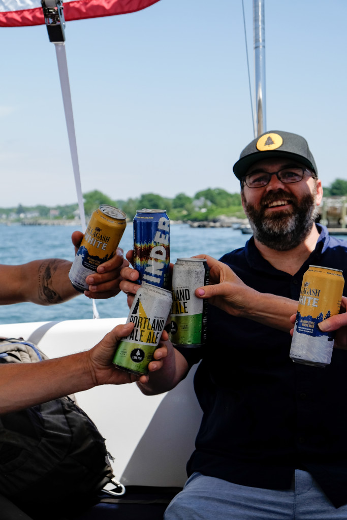 Group Cheers on Boat. Photo Credit: Portland Explorer
