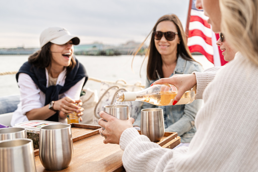 Friends on Boat. Photo Credit: Kayla Holcomb Photography