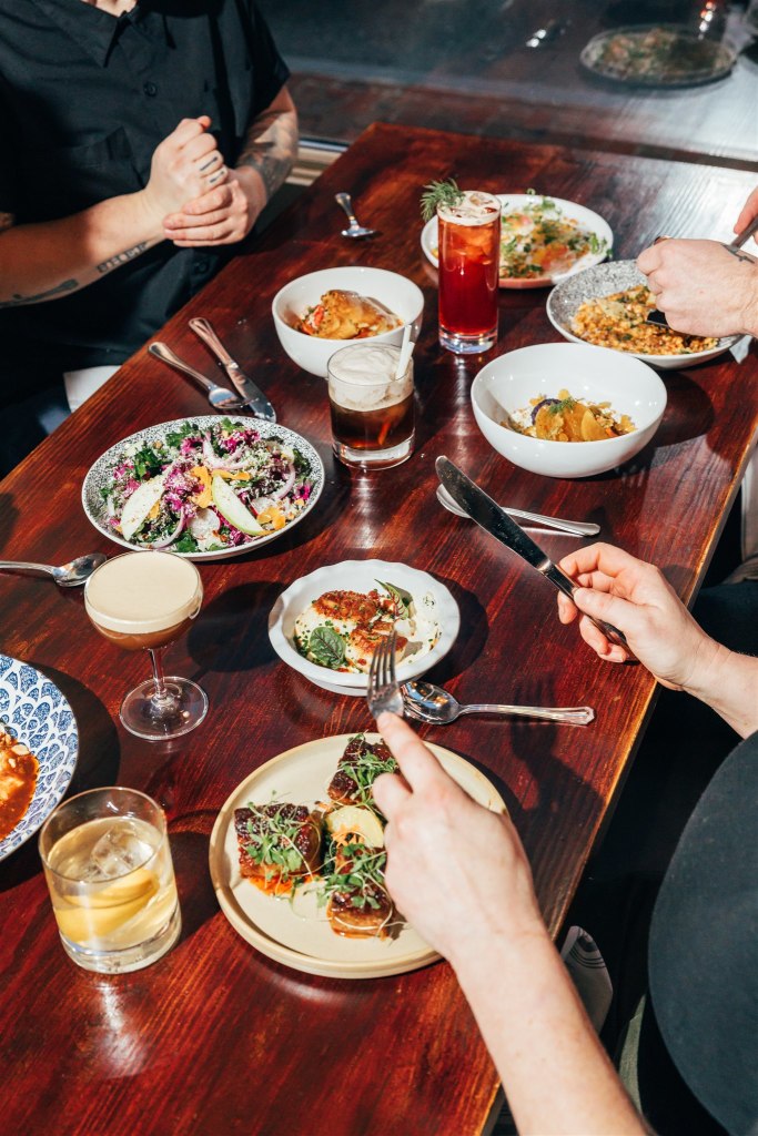 Dining at Sur Lie. Photo Credit: Dawson Renaud Photo and Film