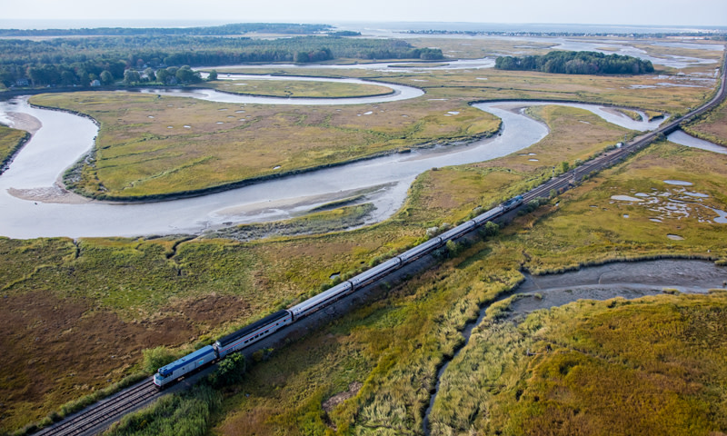 Amtrak through the marsh. Photo Credit: Dave Cleaveland Maine Imaging