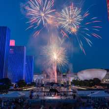 Fireworks in on a dark blue sky at the Empire State Plaza in Albany, New York.