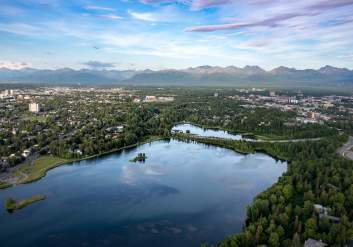 An aerial view of Anchorage over Westchester Lagoon.