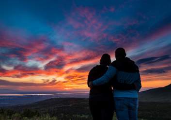 Couple admiring the sunset in Anchorage