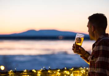 Drinking beer on the deck at 49th State Brewing in Anchorage.