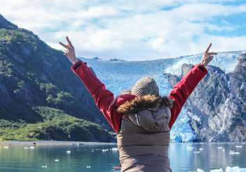 Exploring glacier in Blackstone Bay aboard a day cruise near Whittier, Alaska during summer.