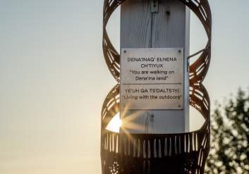 A Dena'ina place names marker stands recognizing Nuch'ishtunt: the place protected from the wind.