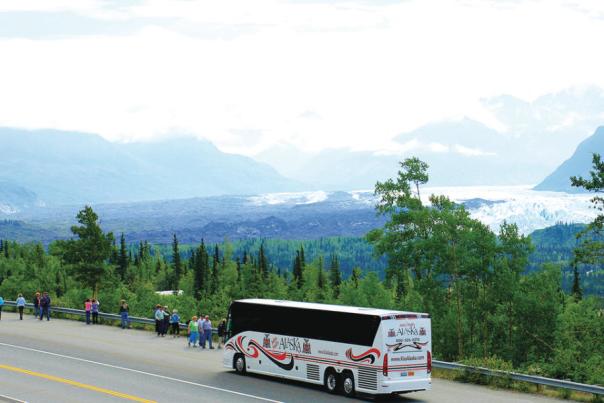 A coach at a scenic overlook in Alaska.