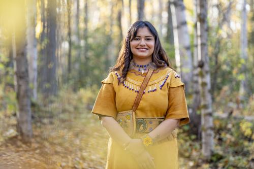 A woman dressed in traditional Dena'ina Athabascan clothing.