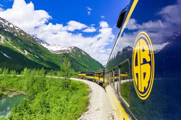 The Alaska Railroad's Glacier Discovery Train steams through the Chugach Mountains and the Grandview area.