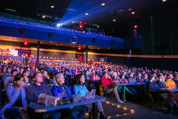 Patrons watch a film at Bear Tooth Theatrepub