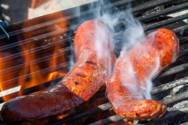 Reindeer hotdogs on the grill - Roy Neese