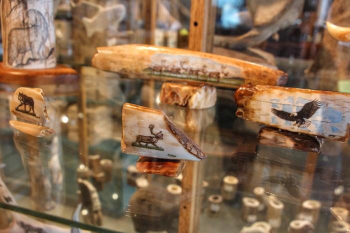 Alaska Native art carvings crafted from bone and antler displayed as handmade gifts.