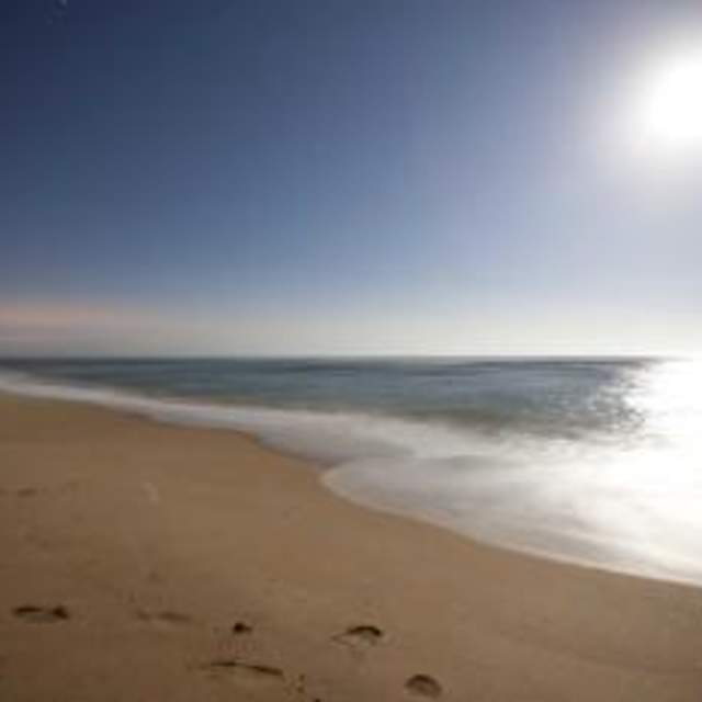 Sun over beach
