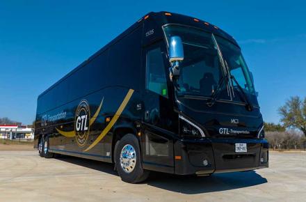 Big Beautiful Motorcoach Black on black with 56 passenger air conditioned