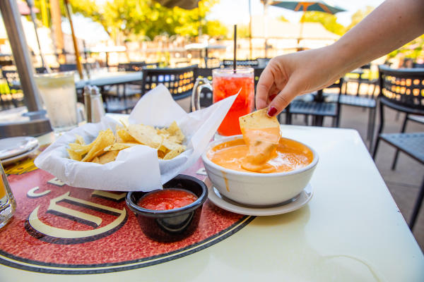 El Gabacho drinks and queso on patio
