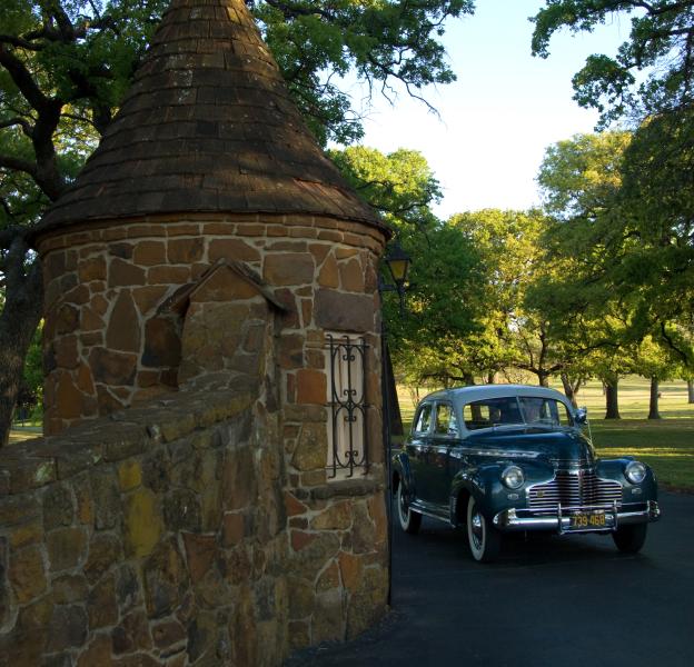 A vintage car near the gate at Top O' Hill Terrace in Arlington, TX