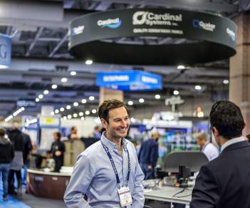 Convention attendees talking