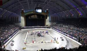 Indoor Auto Racing at Jim Whelan Boardwalk Hall arena with race cars.
